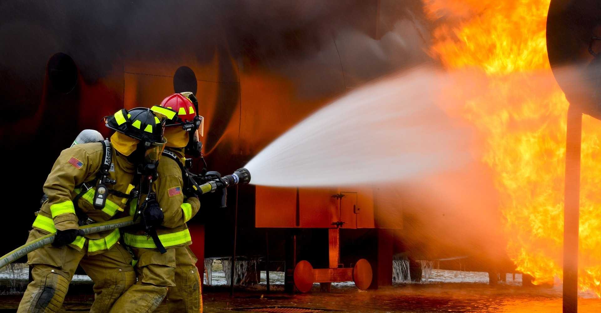 firemen extinguishing a fire