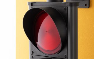 Red lighting of an aluminium traffic light